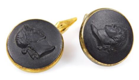 A pair of black basalt cameo cuff links