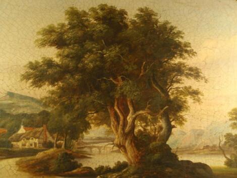 19th Century School. River landscape with cottages beyond an aged tree