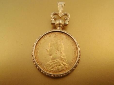 A 9ct gold fob enclosing an 1893 Jubilee head sovereign