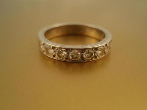 A half hoop diamond set eternity ring