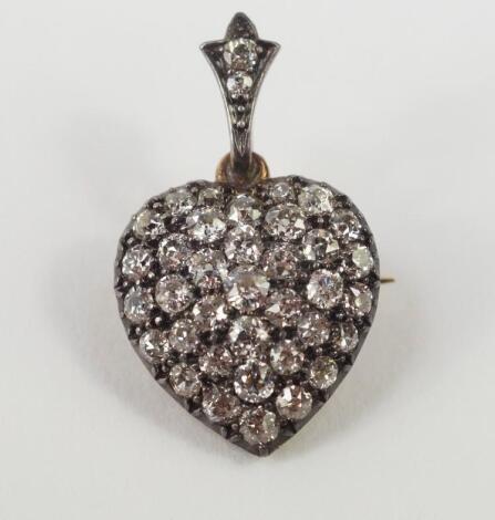 A diamond set heart shaped pendant brooch