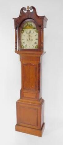 Garratt of Peterborough. A George III oak and mahogany longcase clock