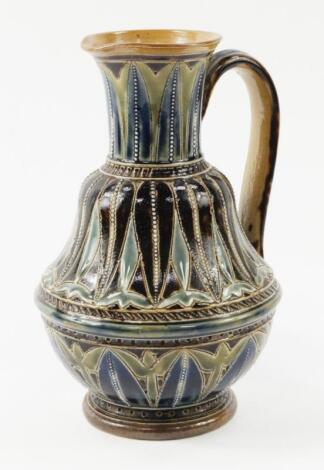 A Doulton Lambeth stoneware jug decorated by Florence Barlow