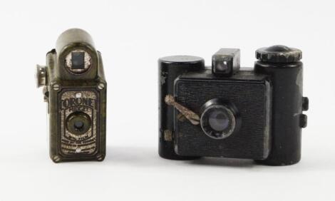 A Coronet green mottled bakelite Midget camera