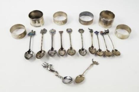 Eleven sterling silver commemorative spoons