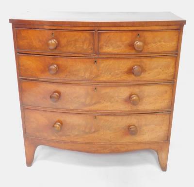 A Victorian bow front mahogany chest of drawers