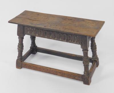 An Elizabethan style oak joint stool
