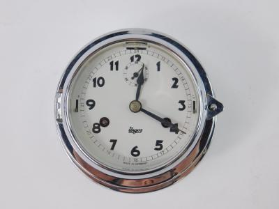 An Urgos chrome plated circular cased ship's clock