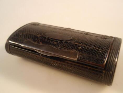 A 19thC ebonised and piquet work snuff box of compressed oval form