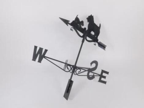 A wrought and cast iron weather vane