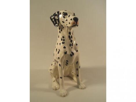 A Beswick fireside seated Dalmatian