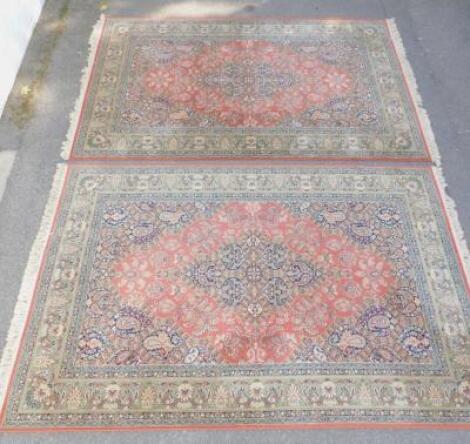 A pair of Kashan type rugs