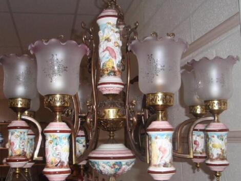 A Continental brass and porcelain eight light electrolier together with