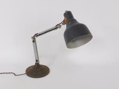 An aluminium and cast iron angle poise type table lamp