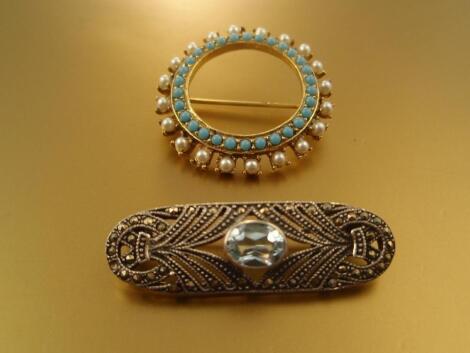 A 1920's style marcasite set plaque brooch set centrally with a pale turquoise stone