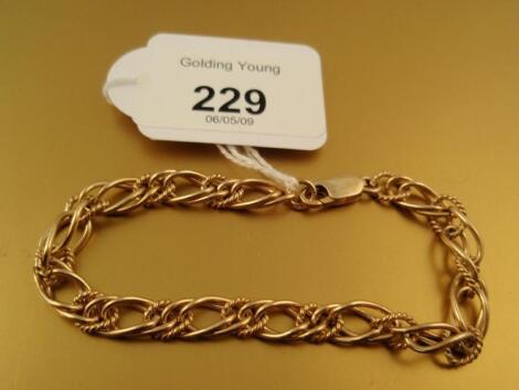 A 9ct gold double fancy link bracelet