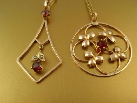 Two openwork pendant necklaces stamped 9ct