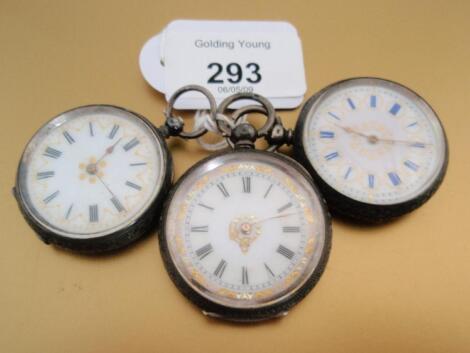 Three mid-size open face silver fob watches