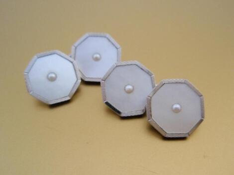 A pair of octagonal cufflinks in white metal stamped 9ct