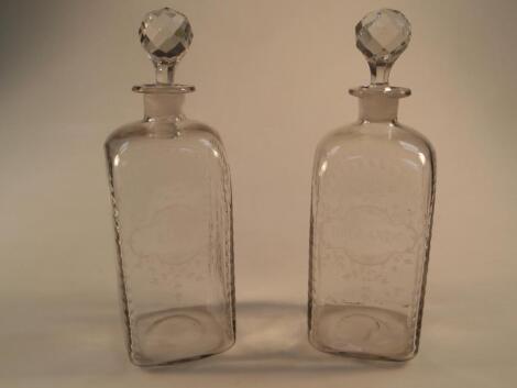 A pair of George III engraved decanters of rectangular shouldered form