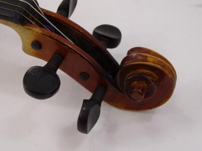 A stained walnut cased violin - 3