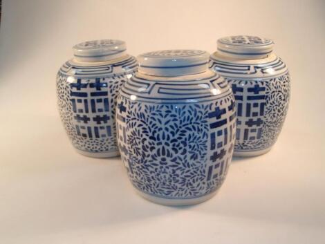 Three Chinese blue and white ginger jars and covers