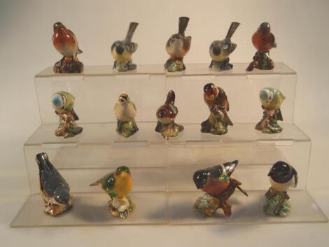 A collection of Beswick small birds