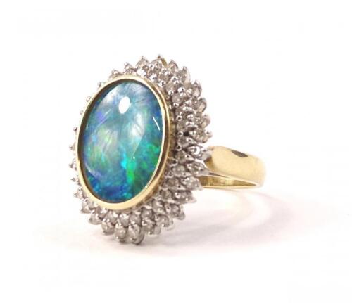 An opal and diamond cluster ring