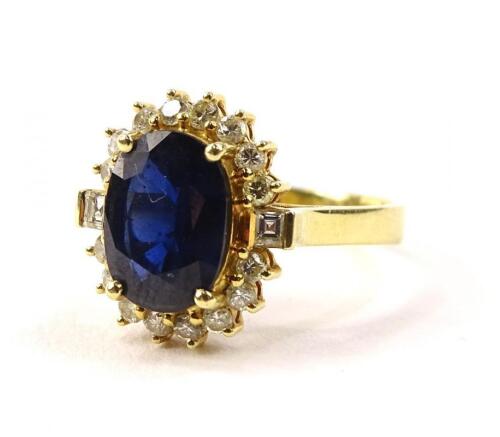 A sapphire and diamond cluster ring