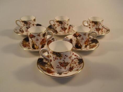 A set of six Coalport Hong Kong pattern coffee cans and saucer