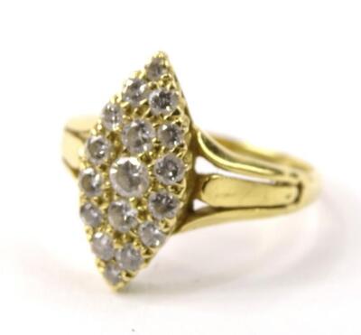 A diamond set pave shaped dress ring