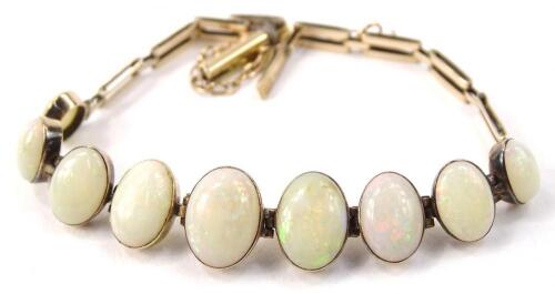 A 9ct gold opal set bracelet