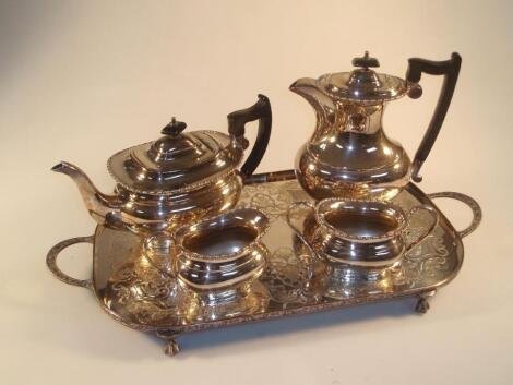 A Viners EPNS four-piece tea service together with a two-handled tea tray