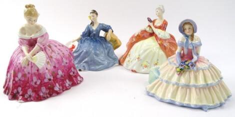 Four various Royal Doulton figures