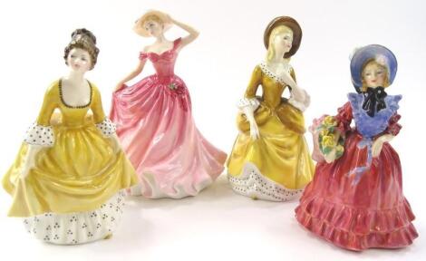 Four various Royal Doulton figures