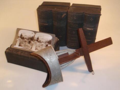 An Underwood & Underwood stereoscopic viewer together with cased sets of