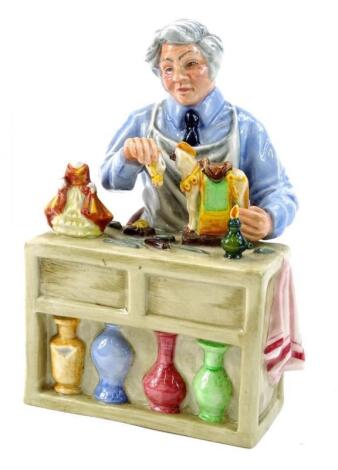 A Royal Doulton figure The China Repairer