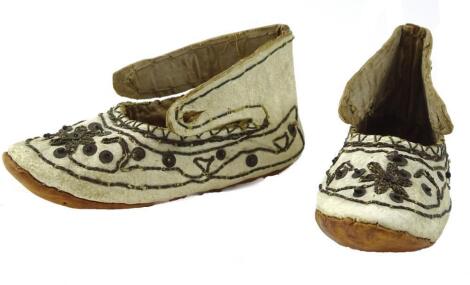 A pair of child's Eastern leather shoes