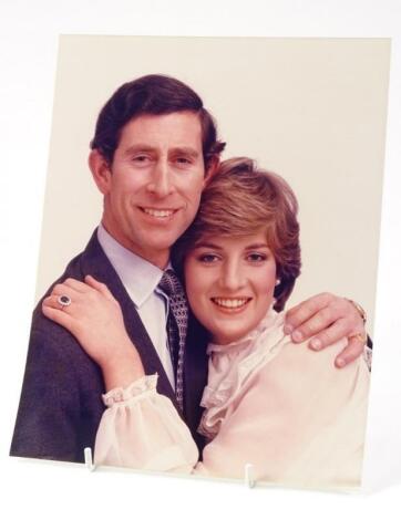 A camera press copyrighted photograph of Prince Charles & Lady Diana Spencer