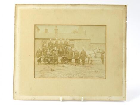 A late 19thC black and white photograph of fire station team