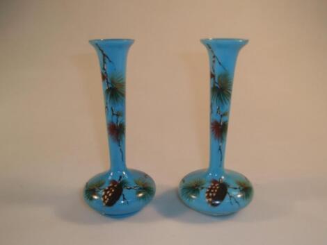 A pair of opaque turquoise glass bottle vases with everted rim and compressed