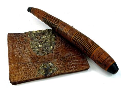 An early 20thC alligator skin pouch