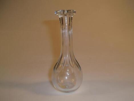 An early 19thC toddy lifter with faceted baluster body