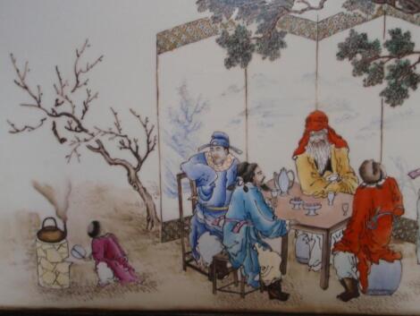 A Chinese painted porcelain table screen