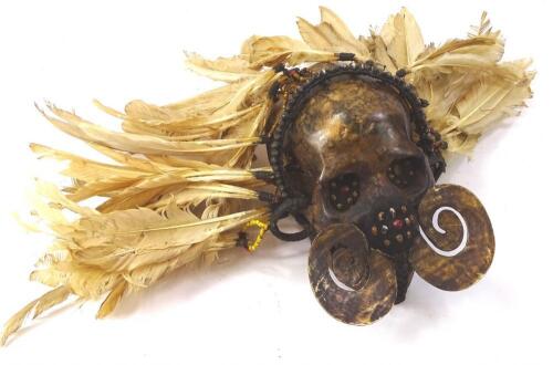 An Asmat tribal style skull