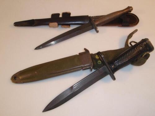 A WWII Fairburn Sykes Commando fighting knife with scabbard