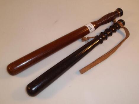 Two turned wood truncheons