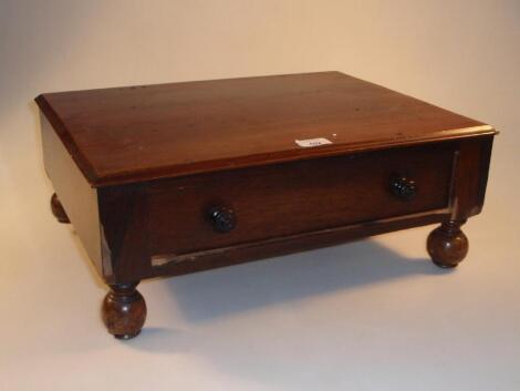 A 19thC rosewood Canterbury base with a single frieze drawer and on bun feet