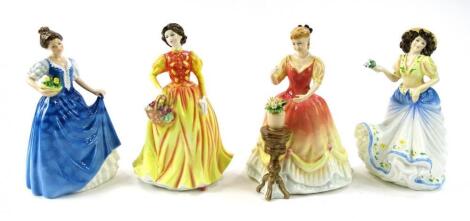 Four various Royal Doulton figures