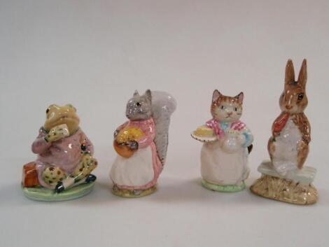 Four Beswick Beatrix Potter figures: Goody Tiptoes